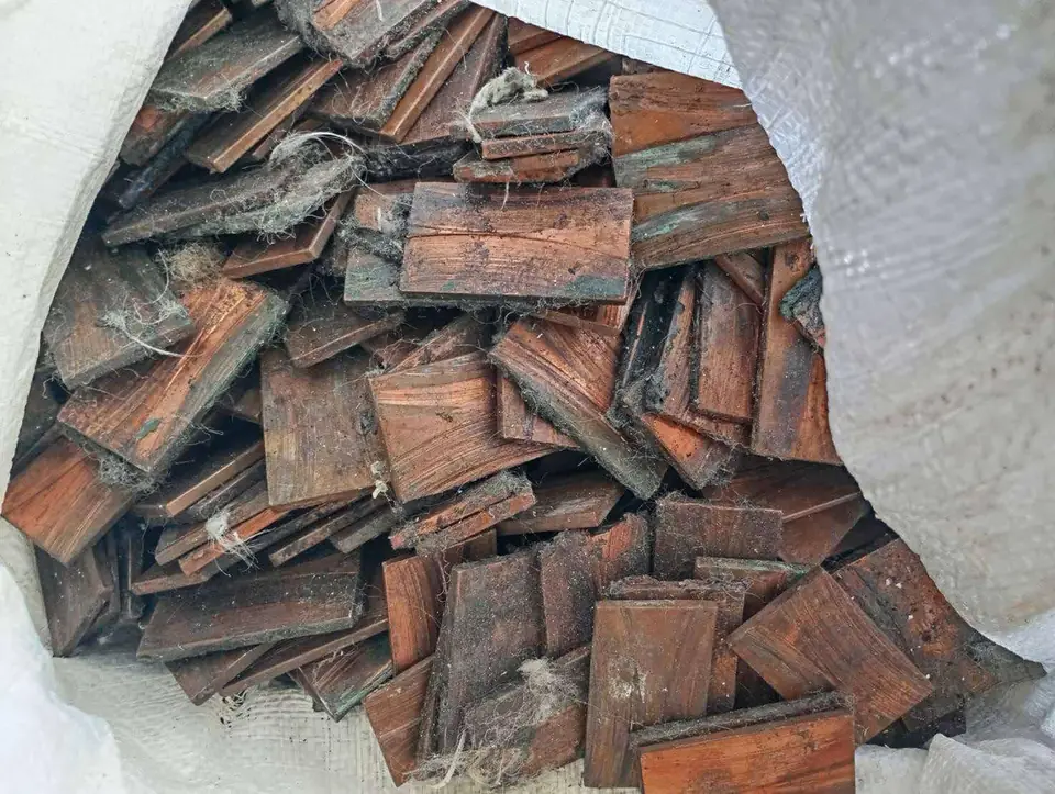 Copper plate offcuts in a sack